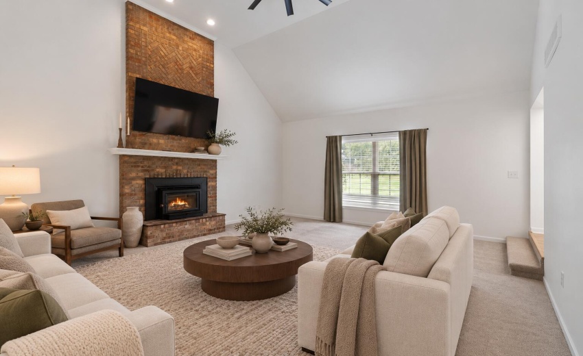 Refined ivory living room staging