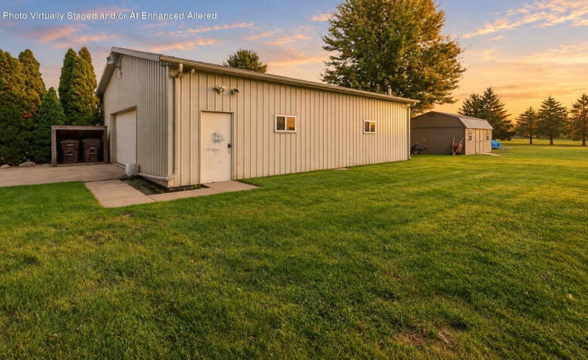 Soft sunset over garage and shed