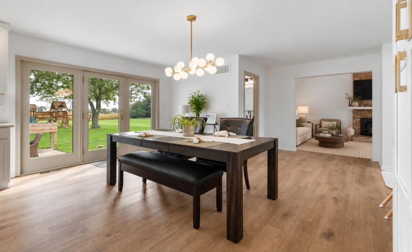 Elegant living room beyond dining doorwa