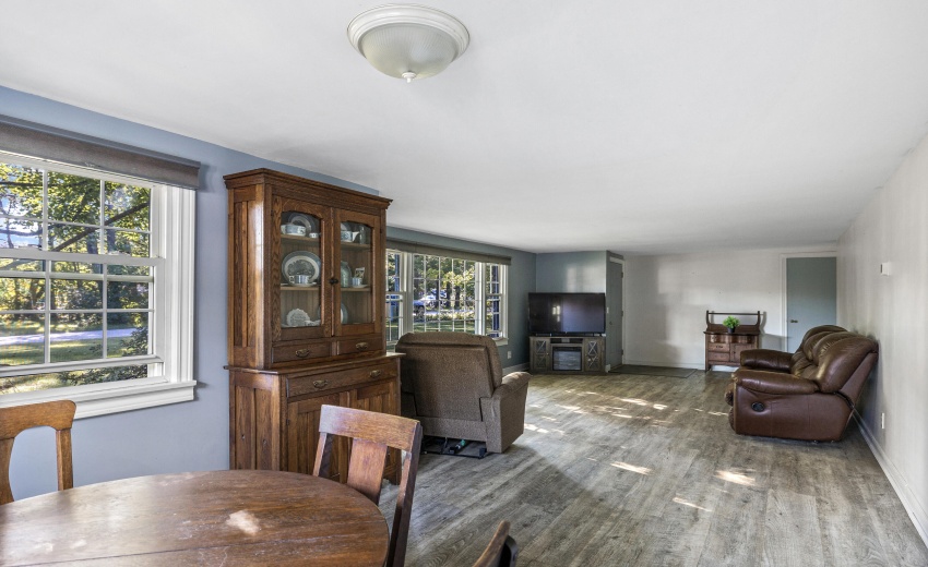 Overview of living, entry way, & dining