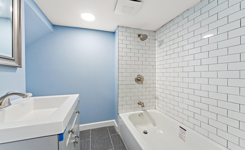 Basement full bath with subway tile