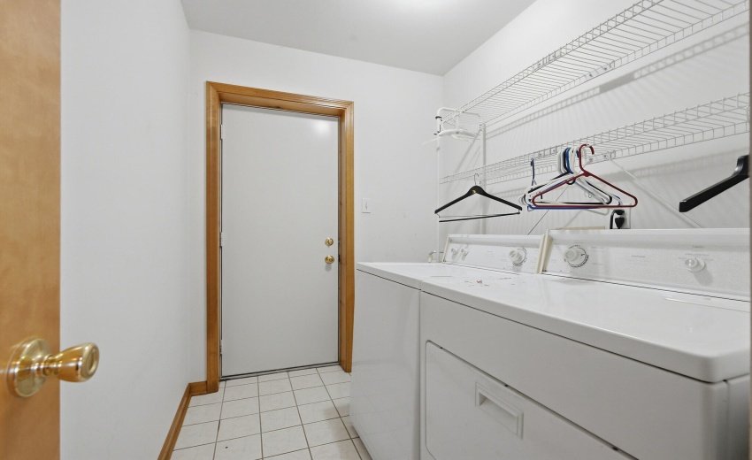 laundry room leading to garage