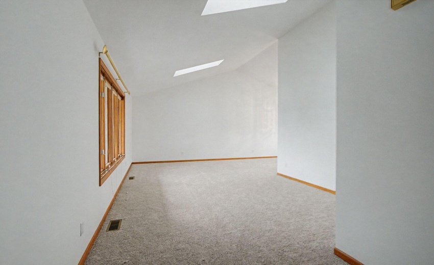 Fresh paint and carpeting in living room