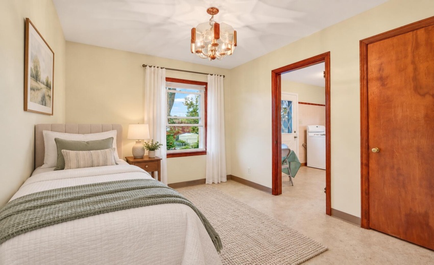 Cozy twin bedroom with sage accents