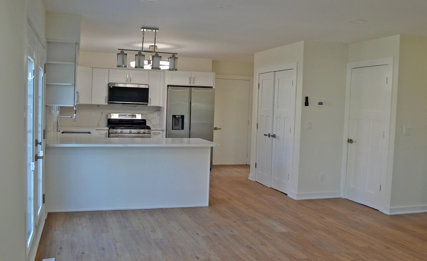 KITCHEN PANTRY AND DOOR TO BASMENT