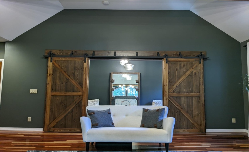 Master Suite w/ Barn Doors leading to a huge Custom Closet and Master Bath