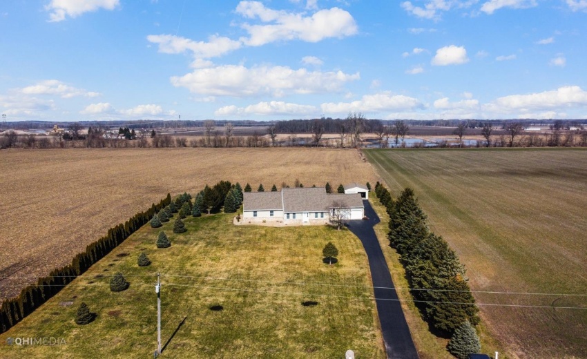 ALL LAND BACK AND INCLUDES 2ND FIELD TO LARGE TREE LINE . ALL THE LEFT OF HOUSE TO 550 E. AND DOWN PAST 1ST FARM HOUSE.  PROPERTY LINE ON RIGHT SIDE OF HOUSE IS THE FIR TREES BACK TO THE FIRST DITCH.