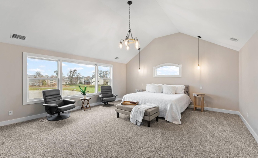 Primary Bedroom with Pond Views