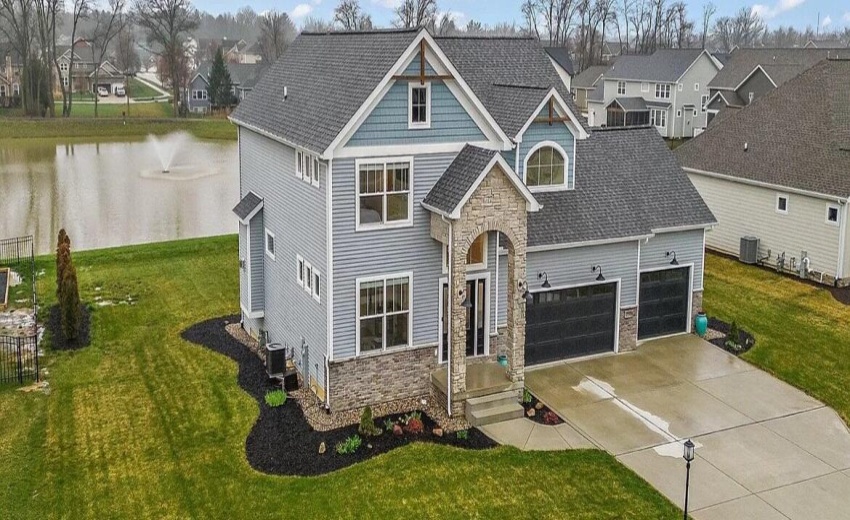 Side Aerial View with Pond