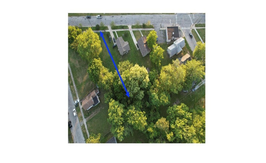 The lot extends the length of the arrow