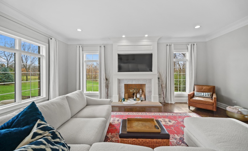 Large Windows Overlooking Back Yard