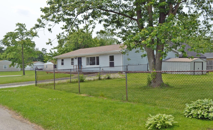 side-view fenced yard n shed