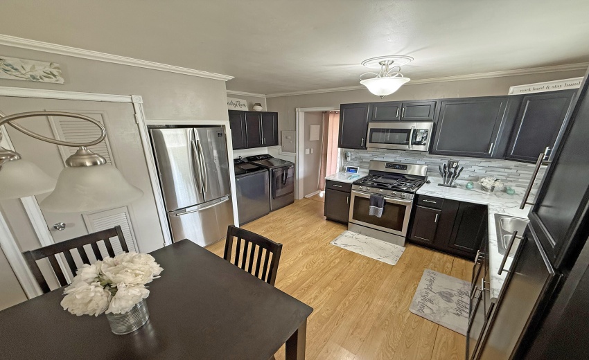 kitchen to den or 4th br