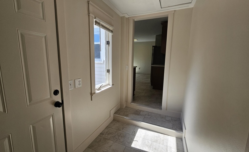 Hall to laundry and bedroom