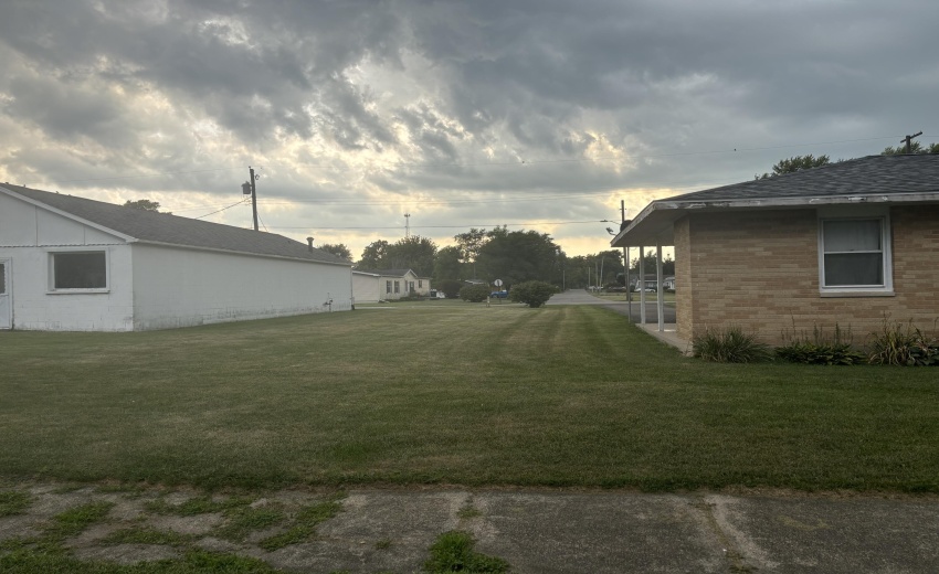 YARD BETWEEN HOME AND GARAGE