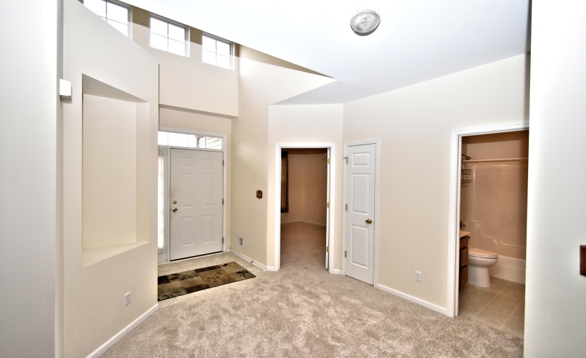 Foyer with 14 ft ceiling