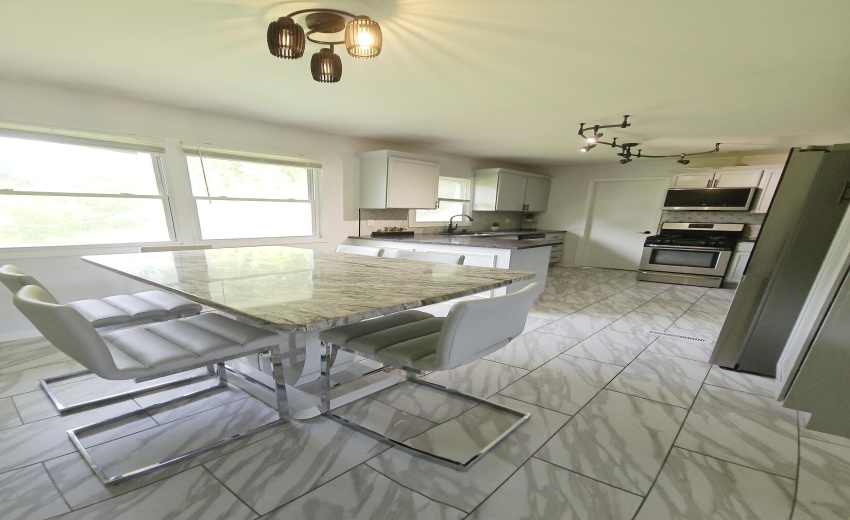 1142 W 72nd Ln Dining Kitchen