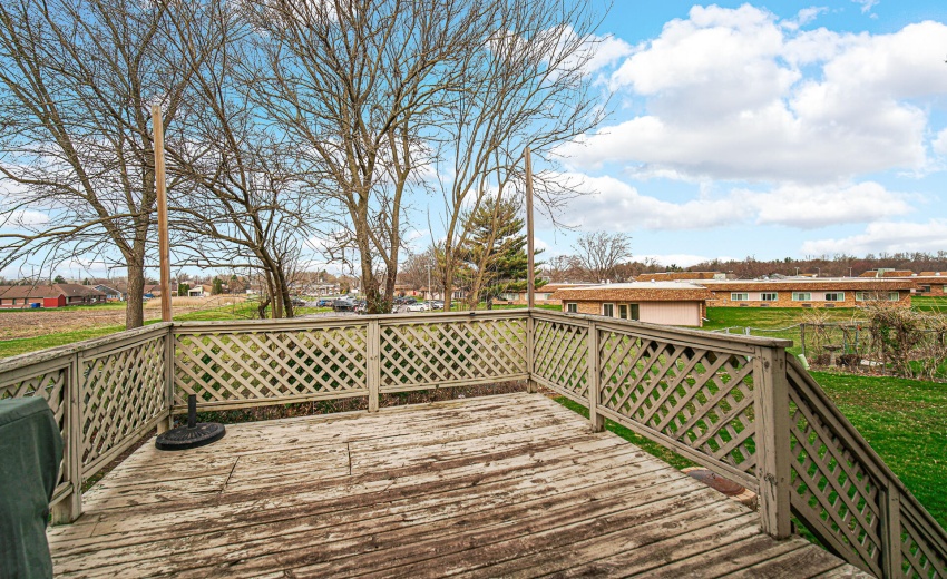 Upper level deck view off dining area.