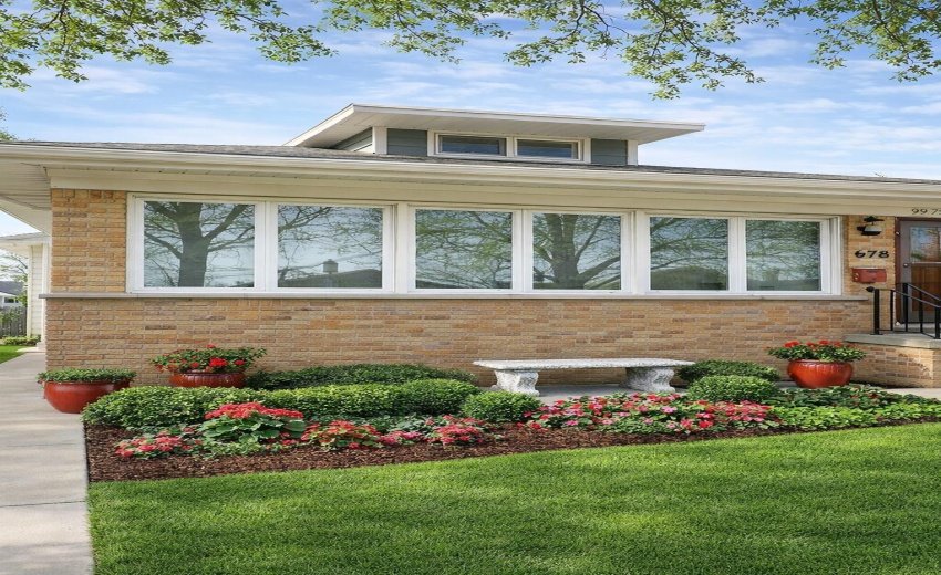 Suburban home with sunroom and garden