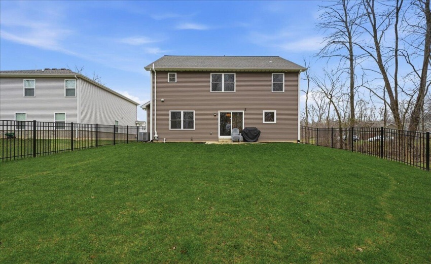 Fenced-in yard with patio