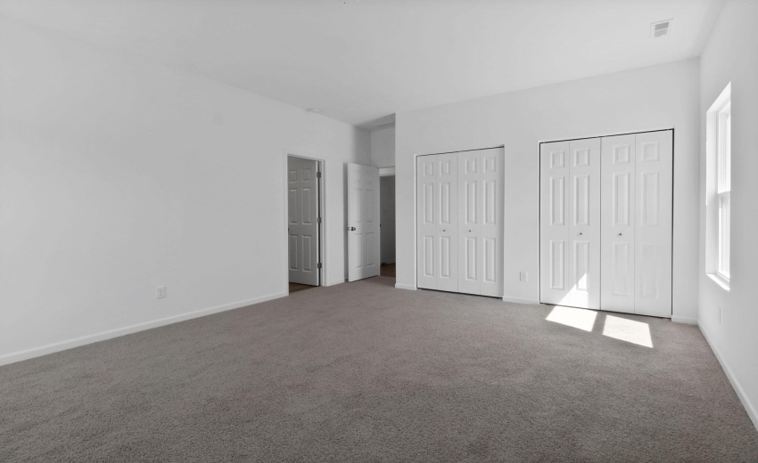 Camelia primary bedroom with 3 closets