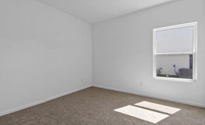 Camelia primary bedroom