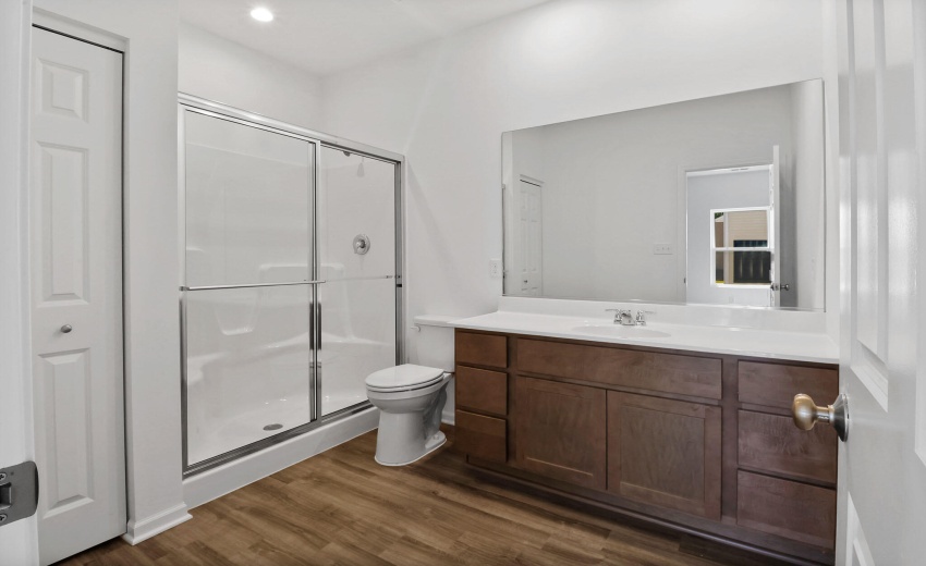 Camelia primary bedroom bathroom