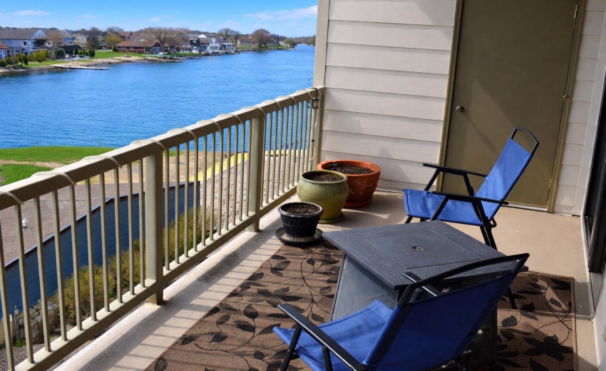 Balcony view over serene lakeside
