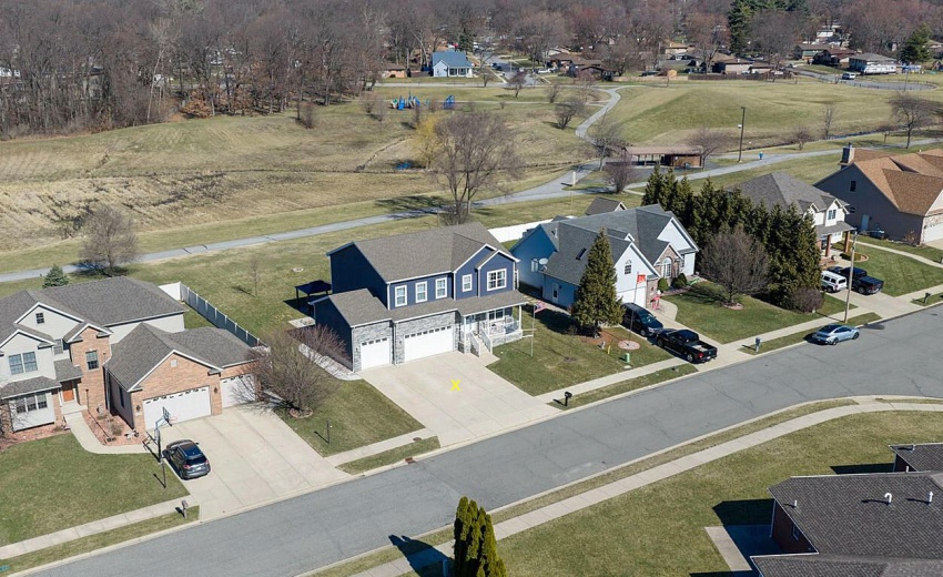 drone street view with trail in back