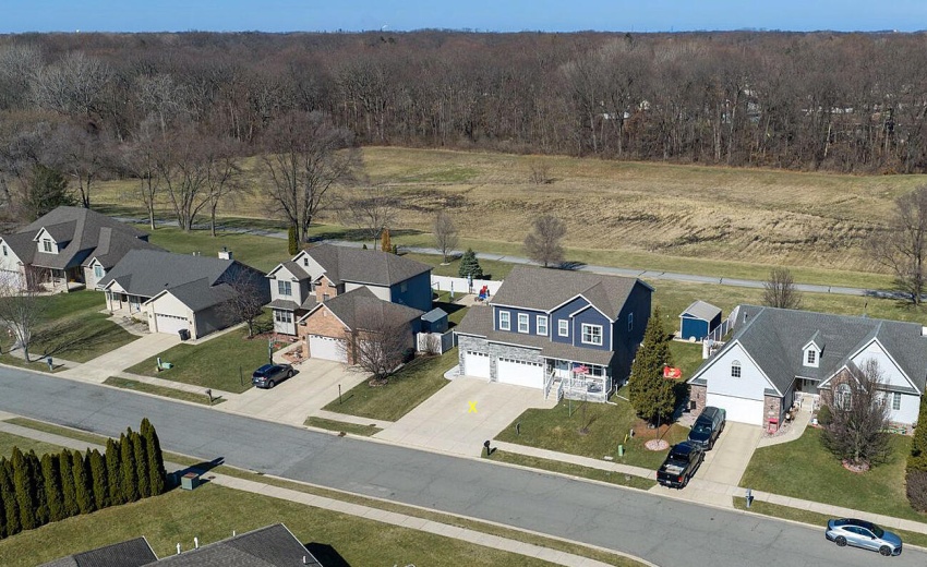 drone street view with woods n trail