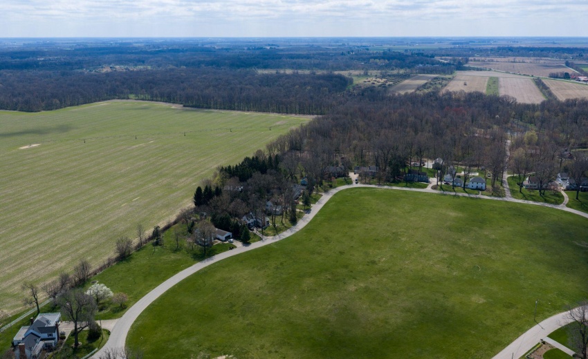 Aerial of circle facing S