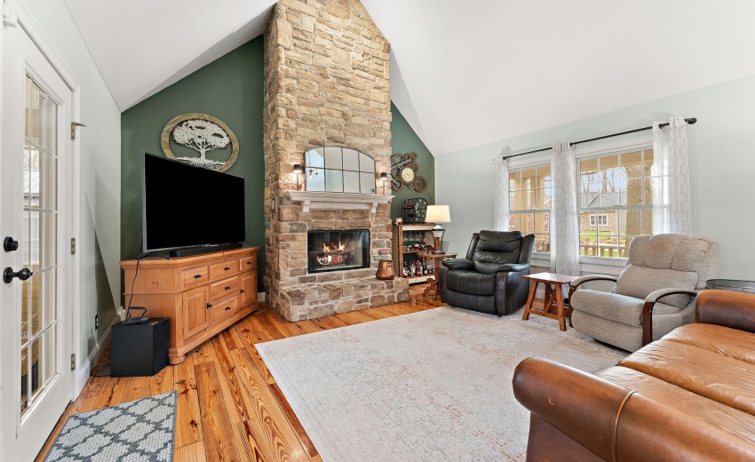 Floor-to-ceiling stone fireplace