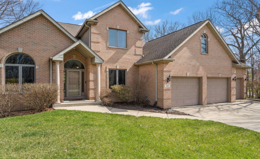 Three Car Brick Front