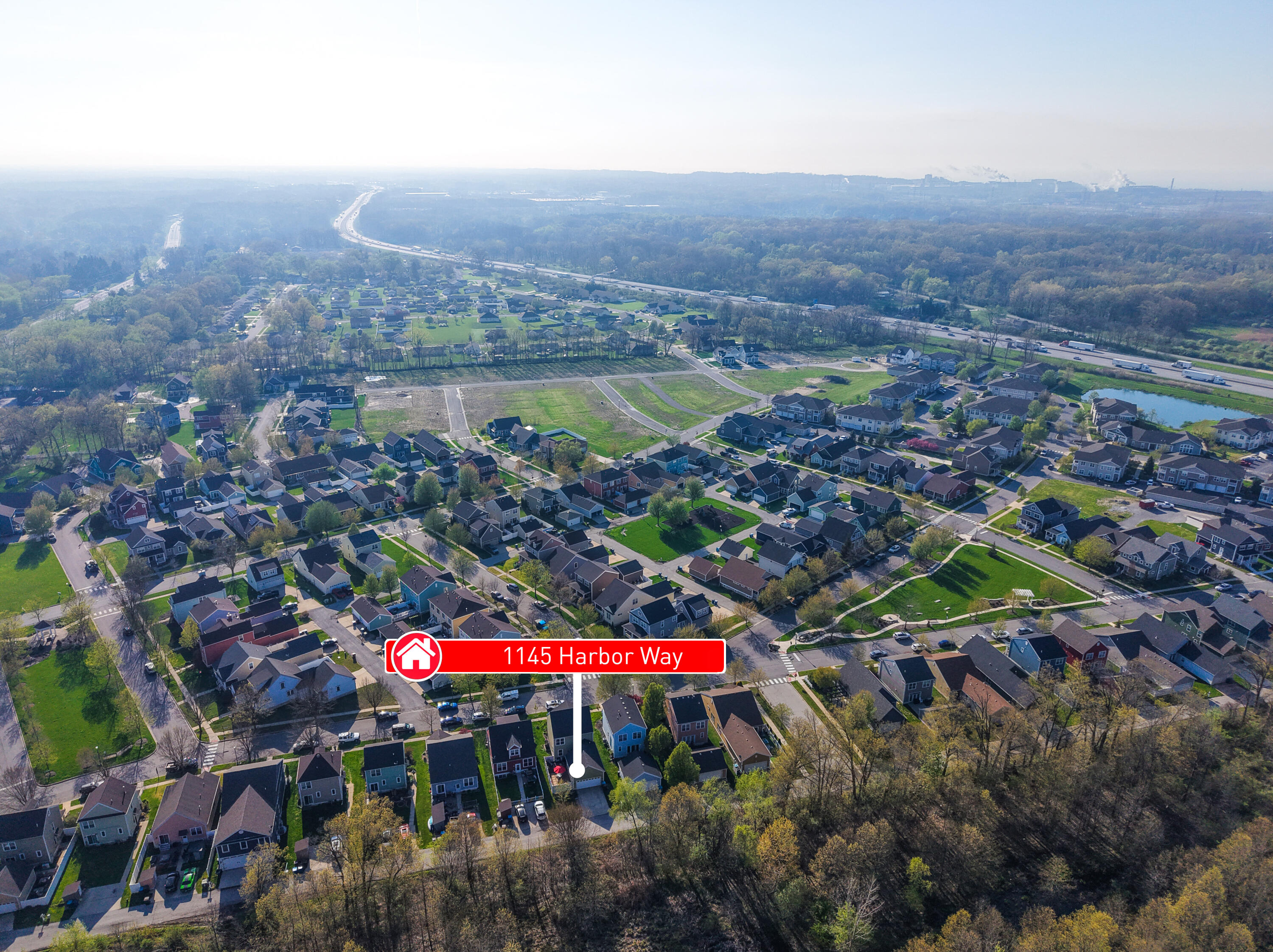 Situated on lot near wooded area