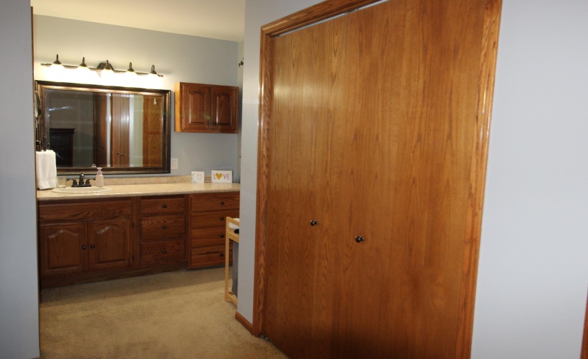 primary bedroom looking into bathroom va