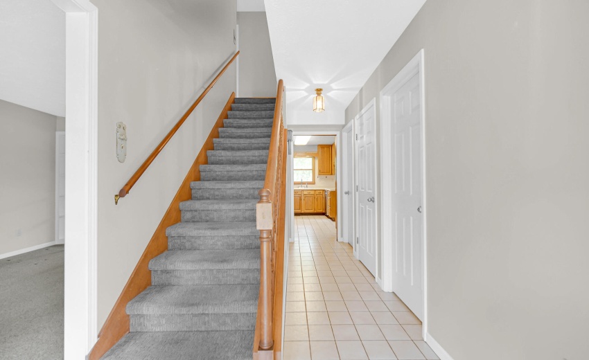 Front entrance with stairway to upstairs