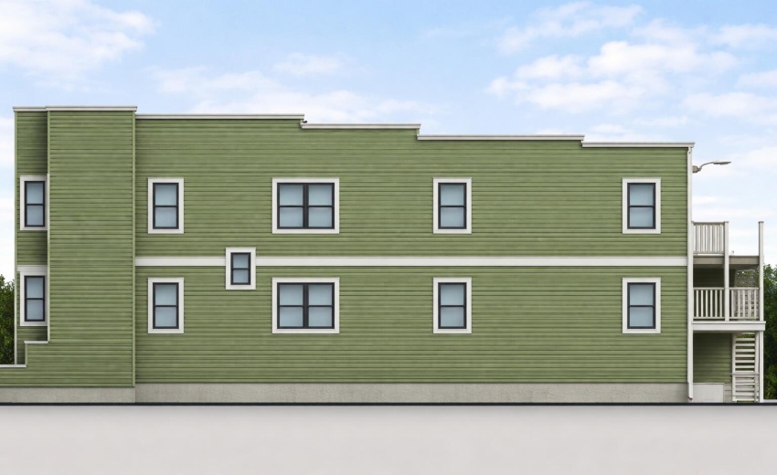 Green siding and white accents