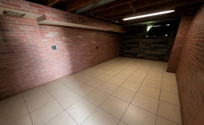 a_wide_angle_interior_photo_of_a_bare_ba