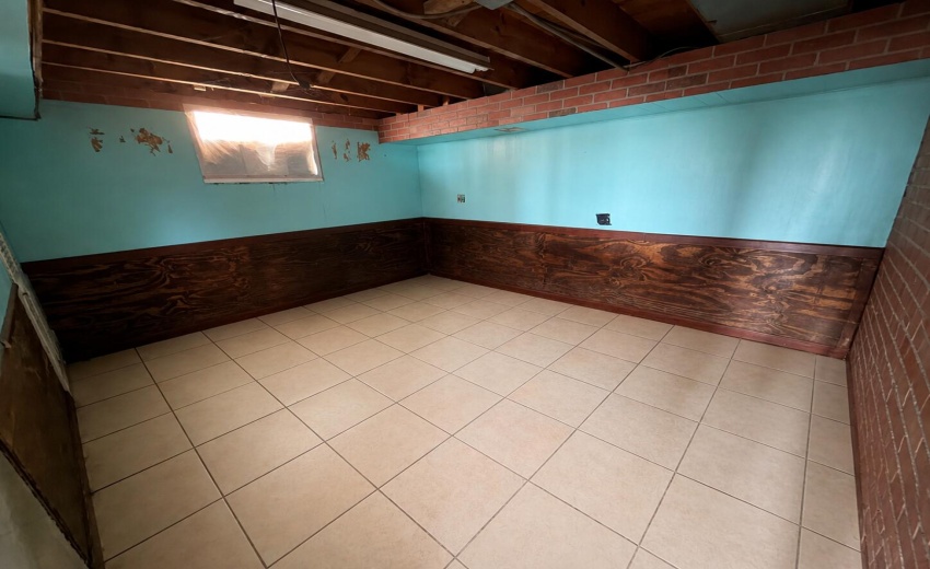 a_wide_angle_interior_photo_of_a_small_b