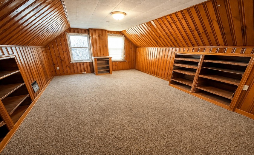 a_wide_angle_empty_attic_like_room_with_
