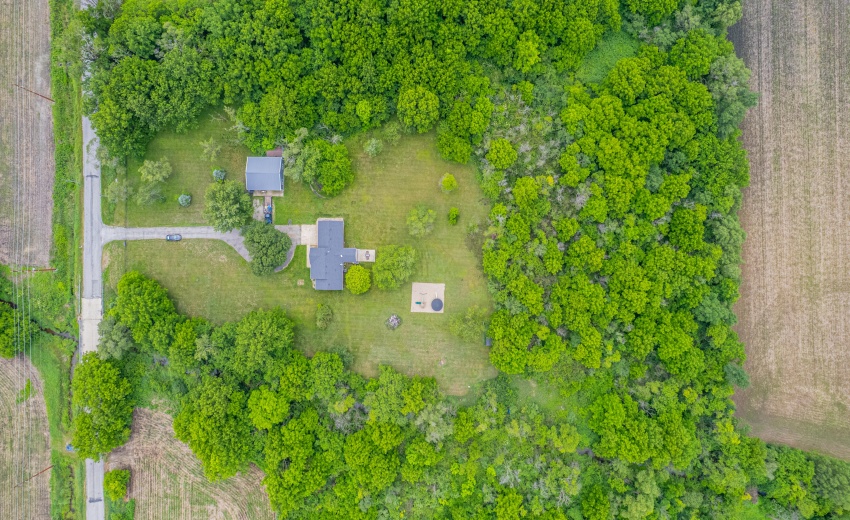 Aerial view of home & pole barn