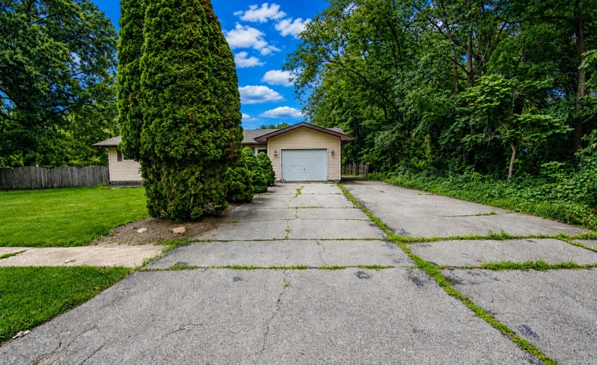 1838 View of front walk way and garage