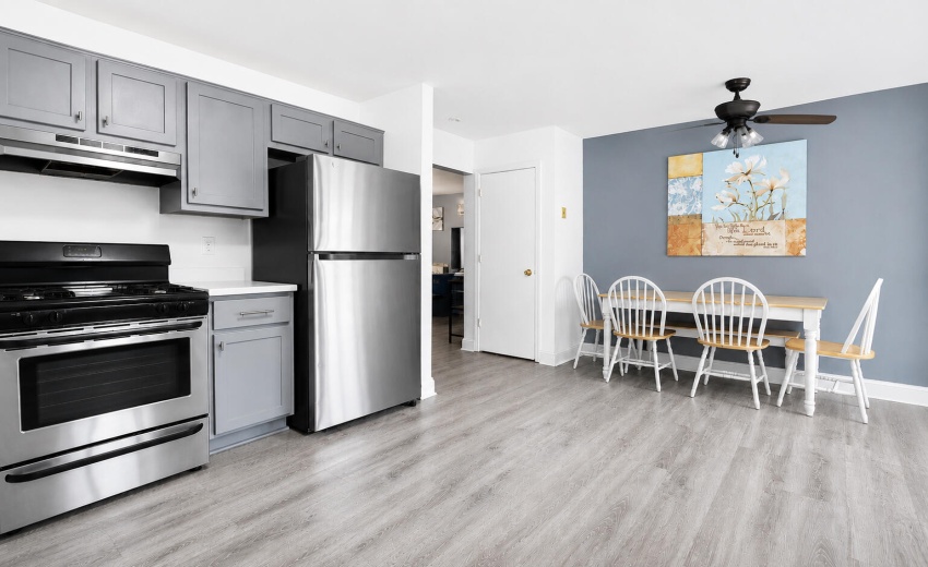 Kitchen view of table and appliances