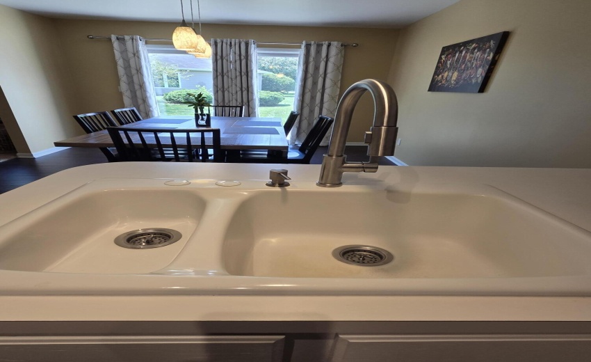 Offset double bowl sink